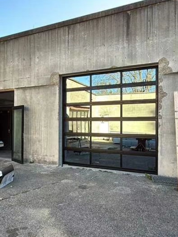 Case of Glass Garage Door installation in Canada warehouse